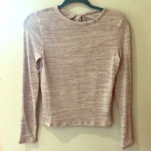 Light grey sheer sweater with open back.